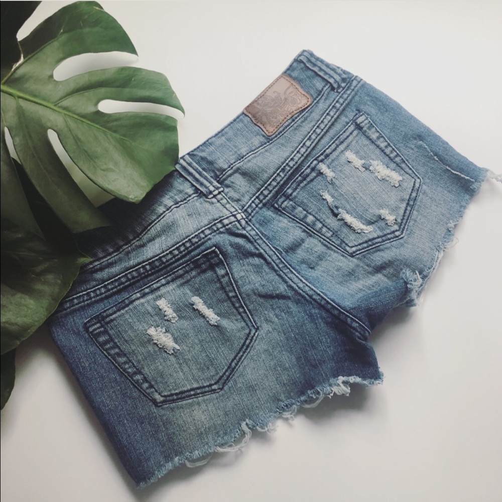 Paris blues distressed jean shorts